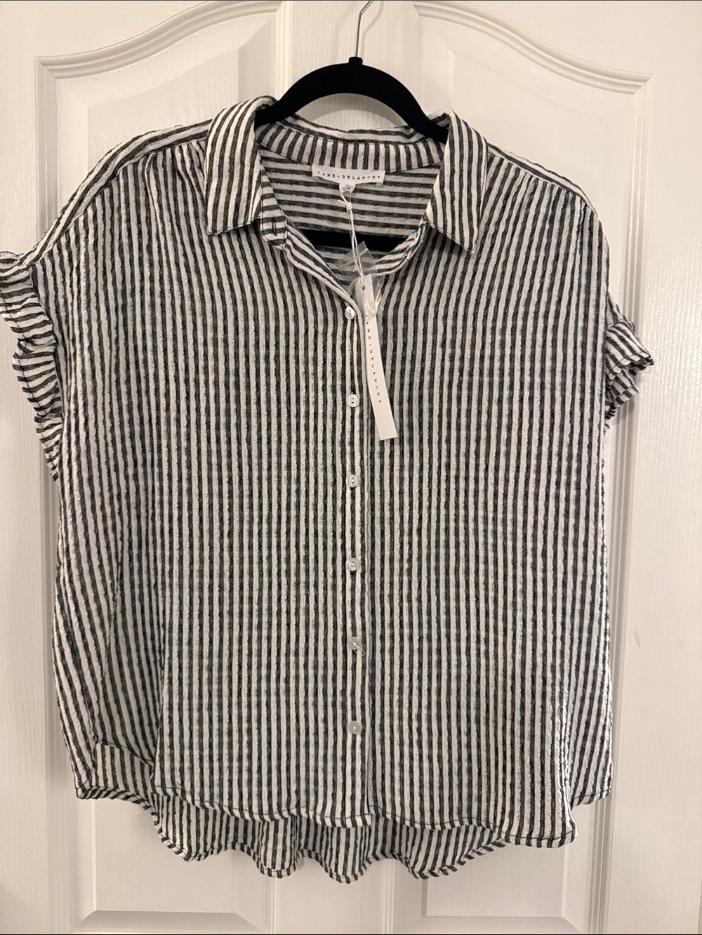 Jane + Delancey Short Sleeve ruffle sleeve short sleeve button down shirt.